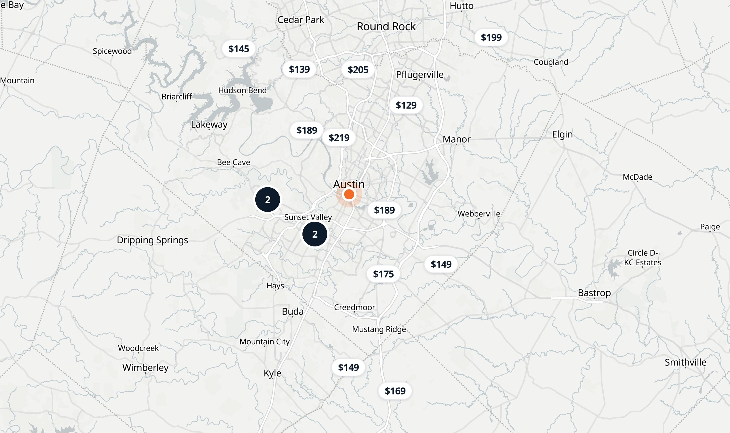 The Find a Photographer map of Austin: the searched address in the middle and each local photographer pinned at their starting price around it.