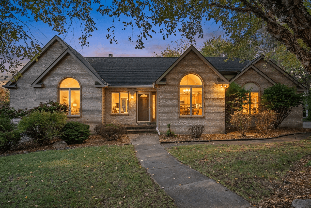 Virtual twilight conversion of a brick home exterior at sunset
